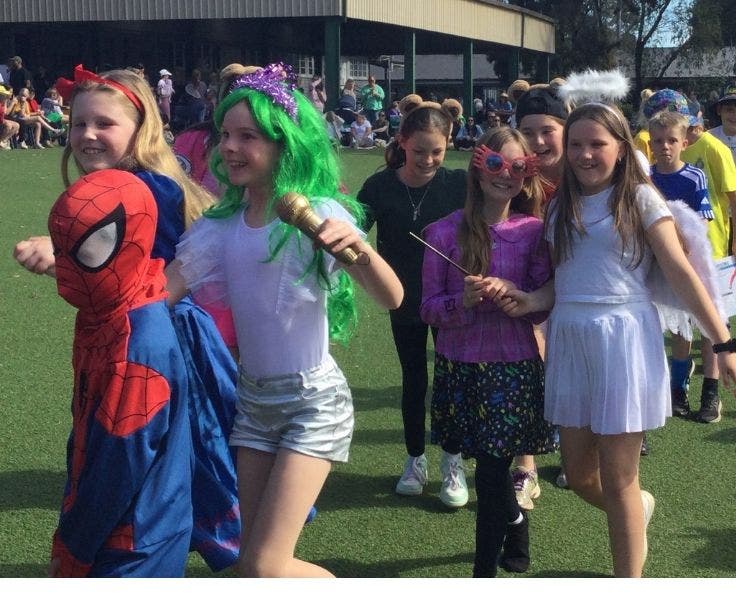 students walking in the book week parade