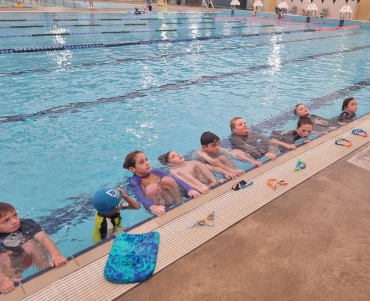 students in the pool